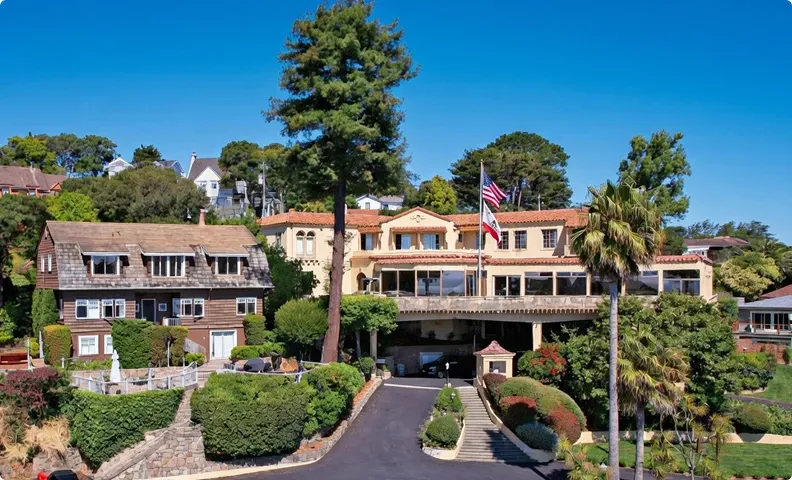 Aerial view of the historic Alta Mira building, gardens and flag in Sausalito