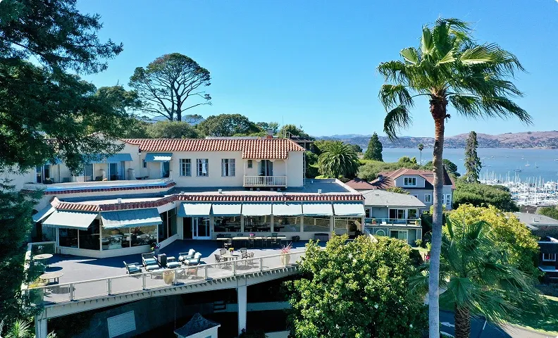 Aerial view of the building with San Francisco Bay behind it
